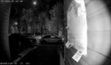 Скриншот с камеры выдеонаблюдения подъезда в доме №36 на улице Олимпийской в Тюмени