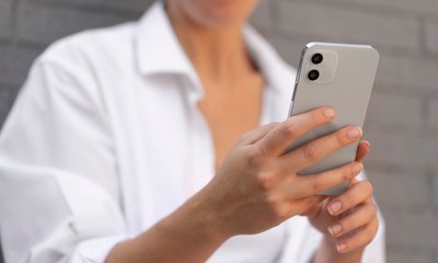 close-up-hands-holding-phone (1)